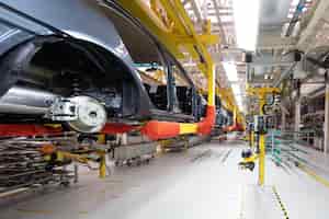 Free photo automated car assembly line plant of automotive industry shop for production and assembly of machines bottom view