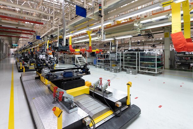 Automated car Assembly line plant of automotive industry Shop for production and Assembly of machines New car warehouse