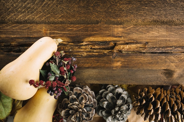 autumn elements on wooden surface