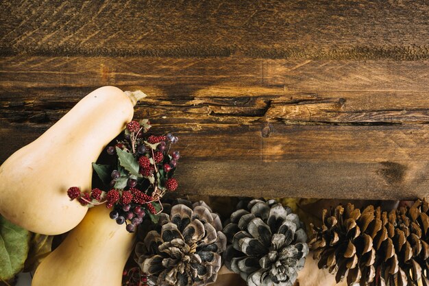 Autumn elements on wooden surface