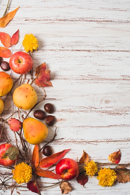 Autumn harvest frame on wooden background