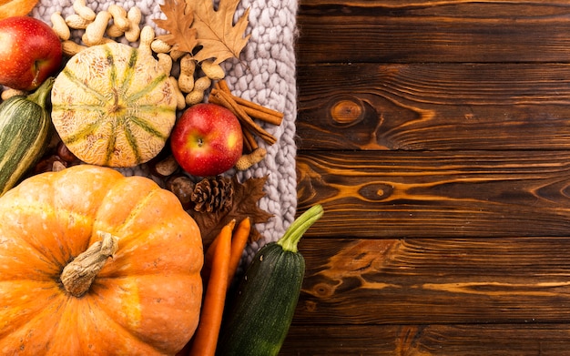 Autumn harvest on wooden background 