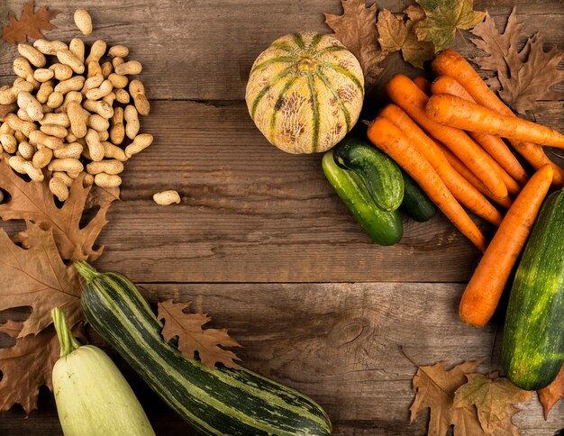 Autumn harvest on wooden background 