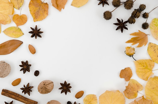 Free photo autumn leaves flat lay with copy space