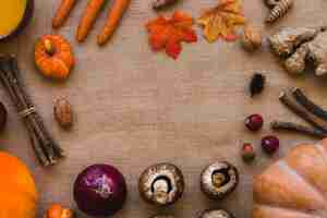 Free photo autumn vegetables and leaves composition