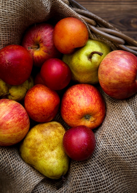 Free photo autumnal arrangement of fresh apples