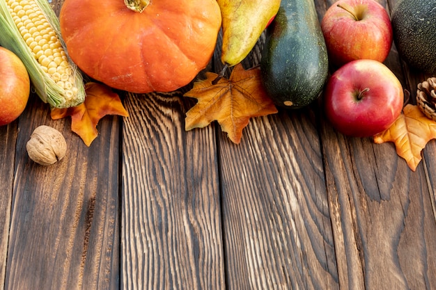 Autumnal frame on wooden table