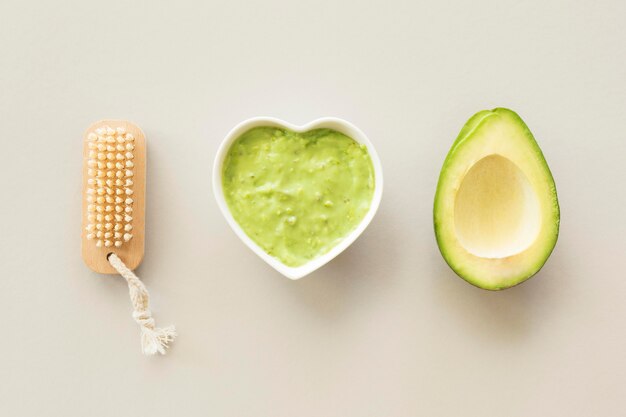 Avocado cream and sponge spa treatment concept