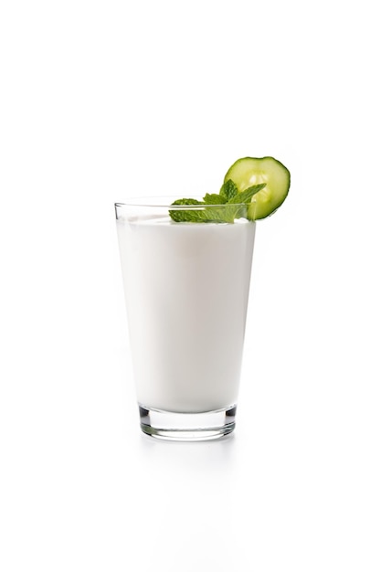 Ayran drink with mint and cucumber in glass isolated on white background