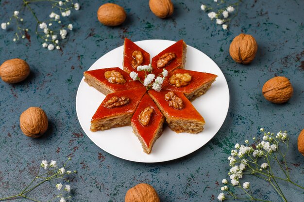 Azerbaijan national pastry pakhlava on white plate  ,top view,spring new year celebration Novruz holiday.