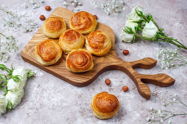 Azerbaijan national pastry qogal on white plate  ,top view,spring new year celebration Novruz holiday.