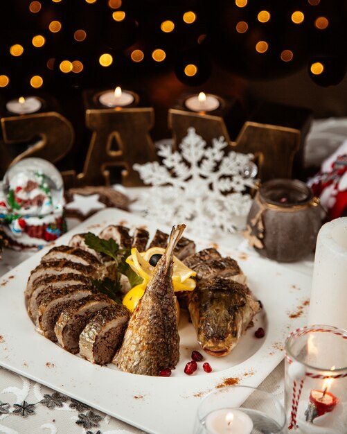 Azerbaijani fish lavanghi with sour walnut onion spices pomegranate filling