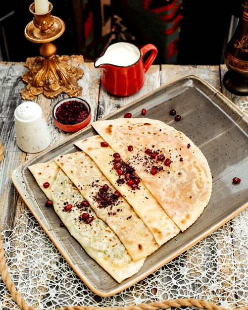 Azerbaijani gutab flatbread wrap stuffed with minced meat and herbs