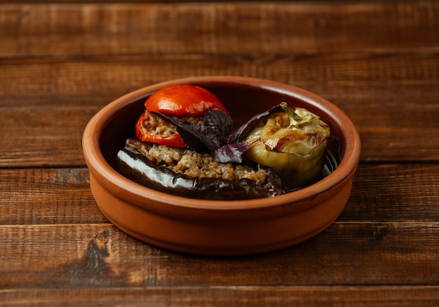 Azerbaijani three veegtable olma, stuffed with meat and herbs