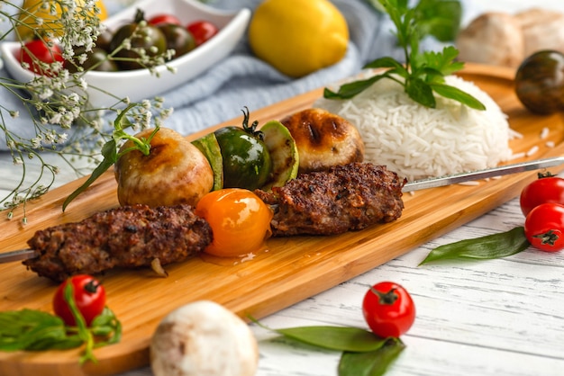 Azeri national lula on a ramrod with boiled rice