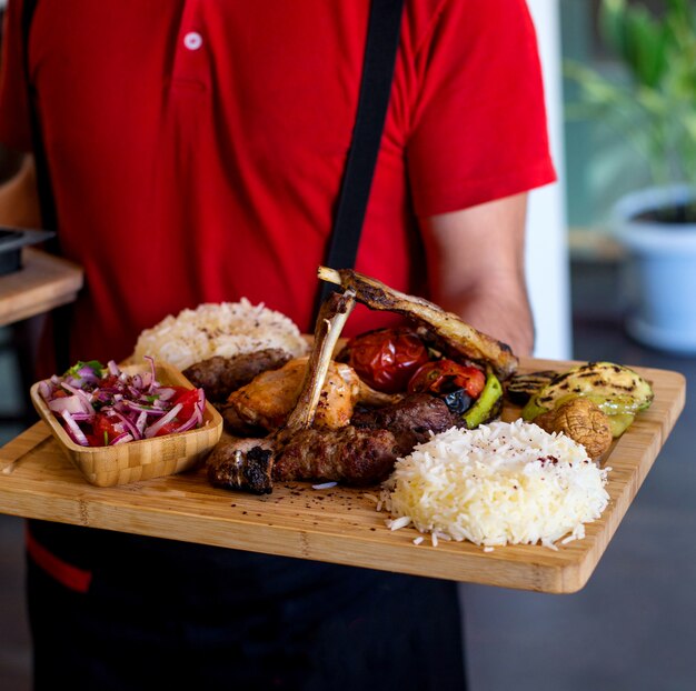 Azeri traditional kebab with rice and vegetables