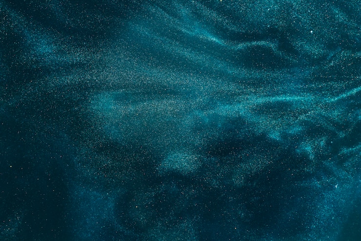 Free Photo azure paint flowing in water
