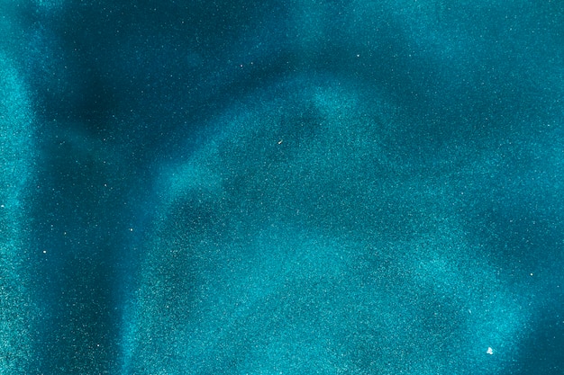 Azure pigment on water
