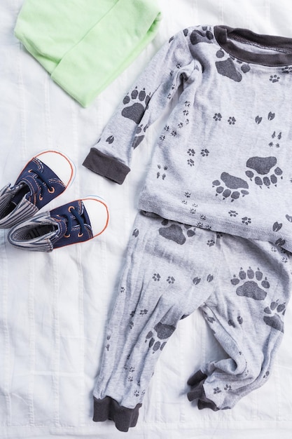 Baby boy clothes on white background