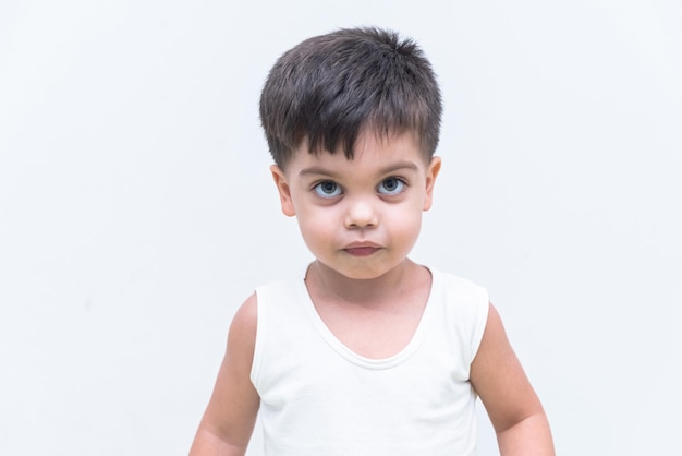 Baby boy in white tshirt over white background