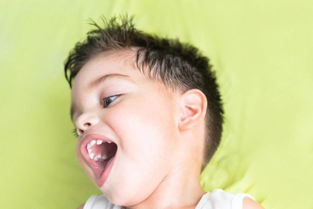 Baby boy with fun expression on his face