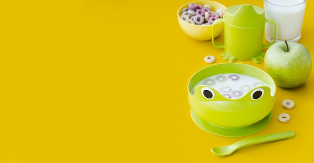 Baby cereals with milk and copy space