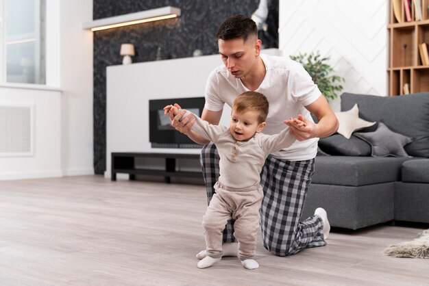 Baby doing his first steps