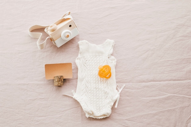 Baby romper and toy camera