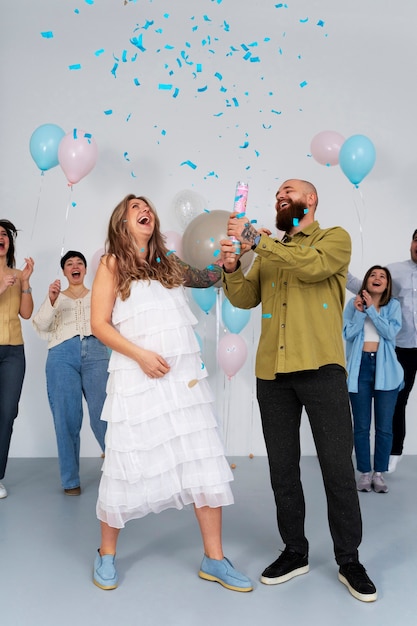 Foto gratuita la festa per la rivelazione del genere del bambino