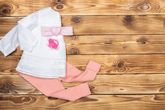 Baby stuff on wooden table