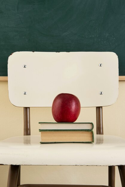 Back to school concept with apple on chair