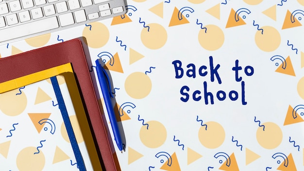 Free photo back to school concept with notebooks and keyboard