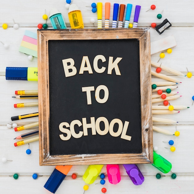 Back to school decoration with slate and pens