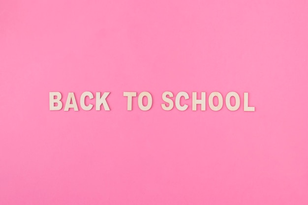 Free photo back to school writing on pink