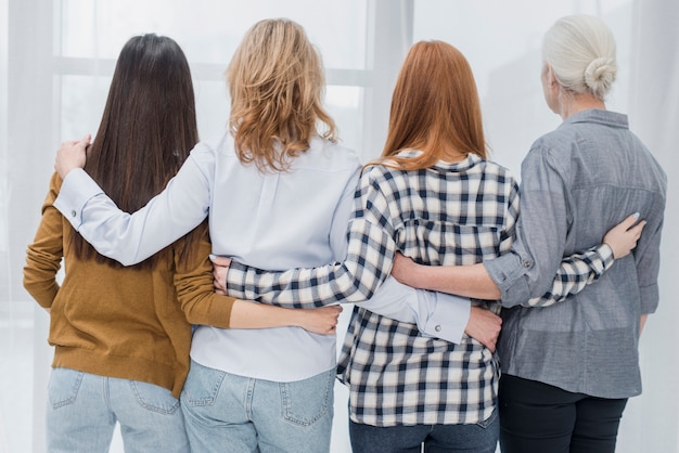 Back view group of women together