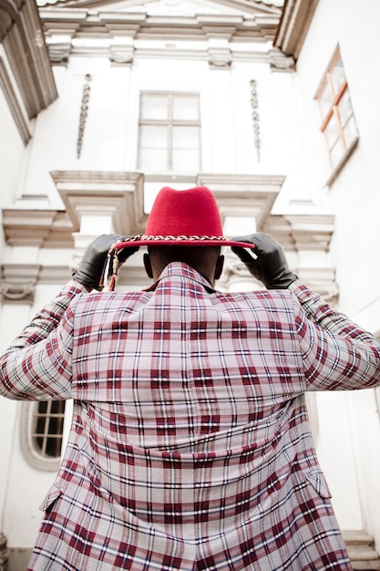 Back view modern young male with stylish hat