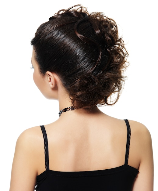 無料写真 白で隔離美しい髪型の女性の背面図