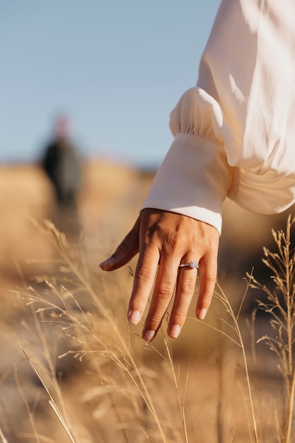 Back view woman wearing married ring