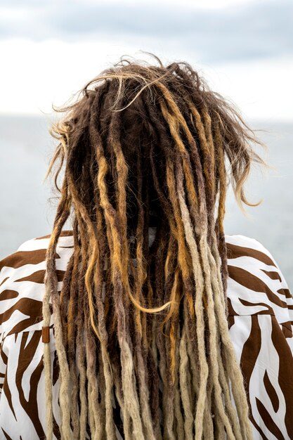 Back view woman with afro dreadlocks