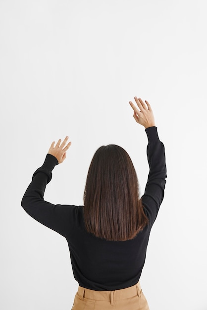 Free photo back view woman with virtual reality headset