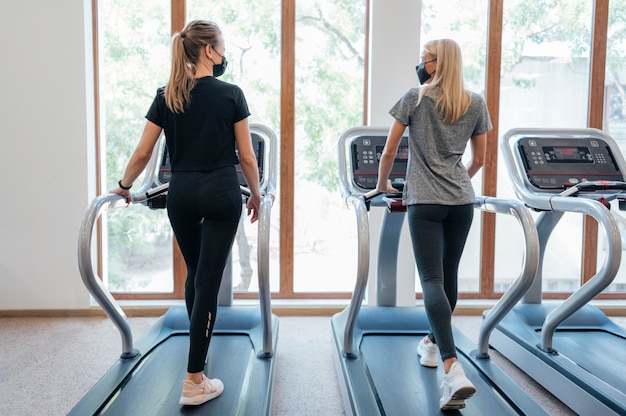 Back view of women at the gym during the pandemic