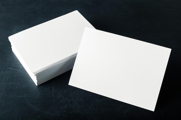 Free photo backed paper blank business cards on the stack