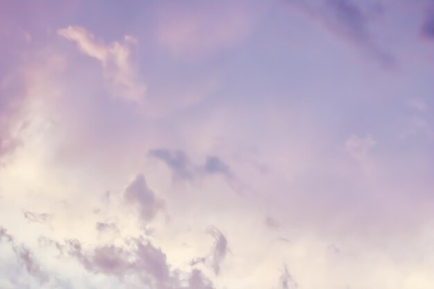 Background of a beautiful pink and pale purple sky with clouds at sunset. high quality photo Premium Photo