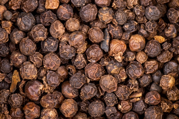 Background of black peppercorn top view