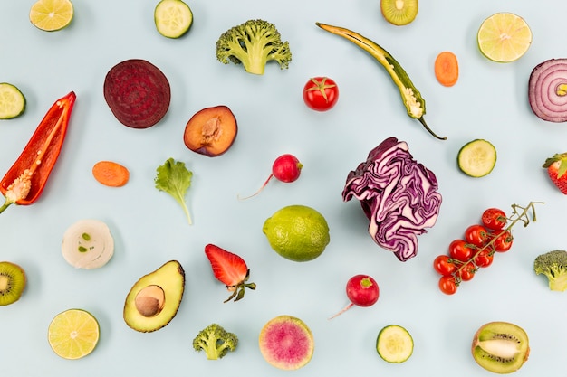 Background blue with veggies and fruit