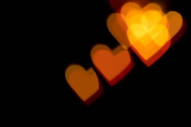 Free photo background bokeh red hearts