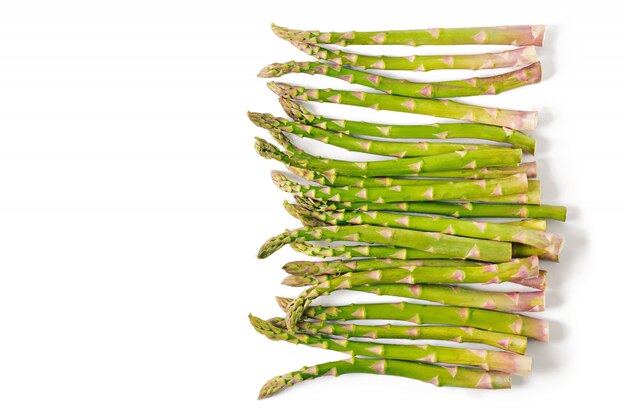 Background from isolated on white background asparagus. Top view