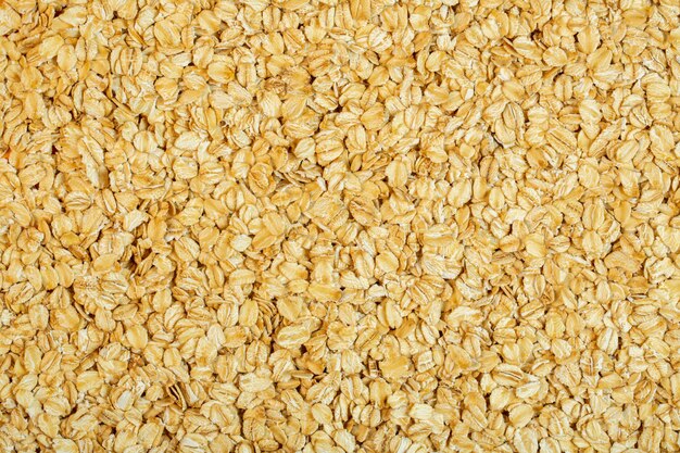 Background of oat flakes top view