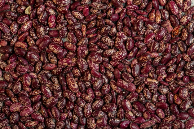 Free photo background of red speckled kidney beans top view