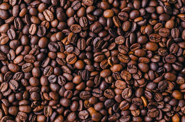 Background of roasted fresh brown coffee beans - perfect for a cool wallpaper